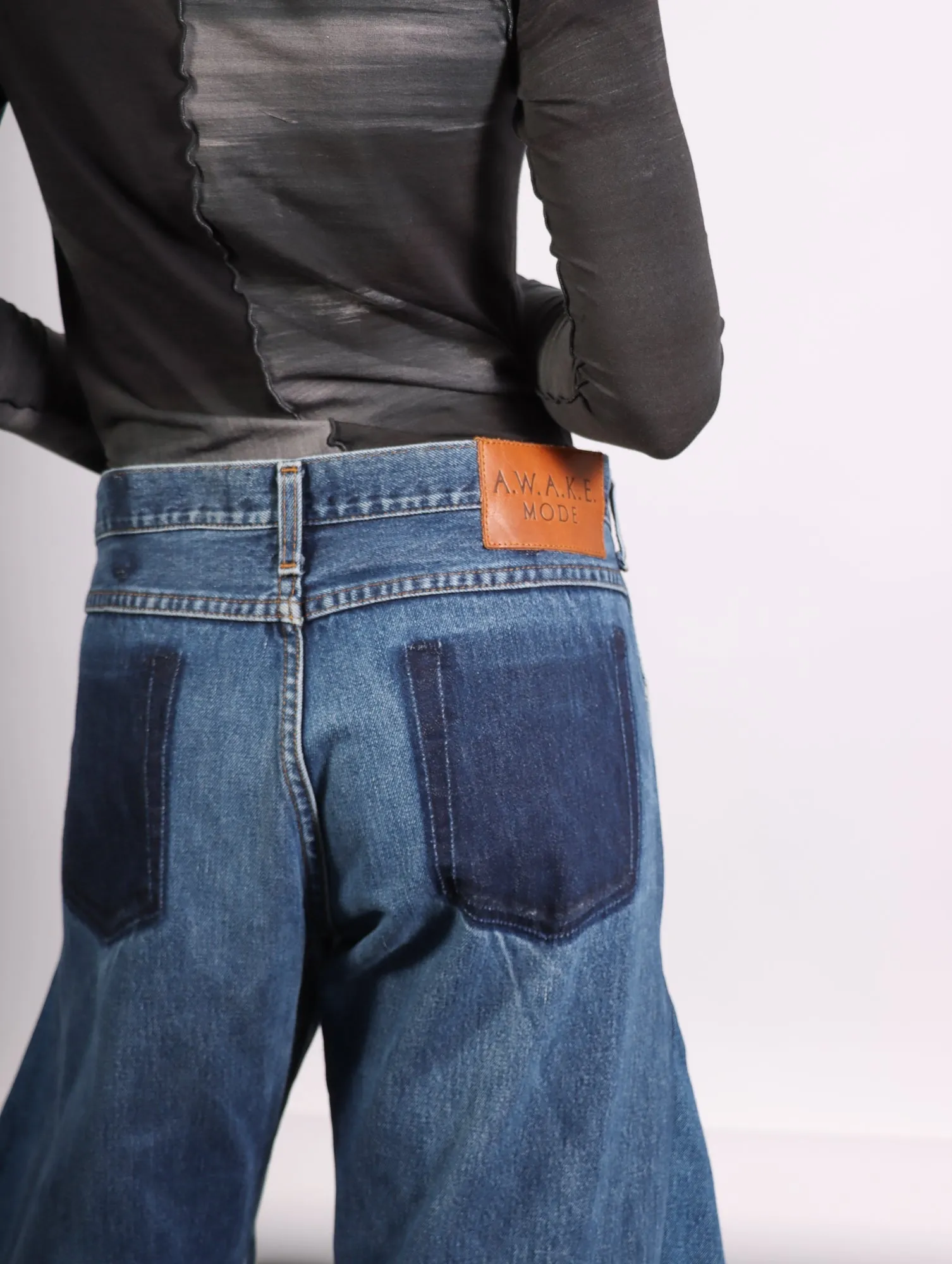 Upcycled Horseshoe Jeans in Blue by A.W.A.K.E. Mode